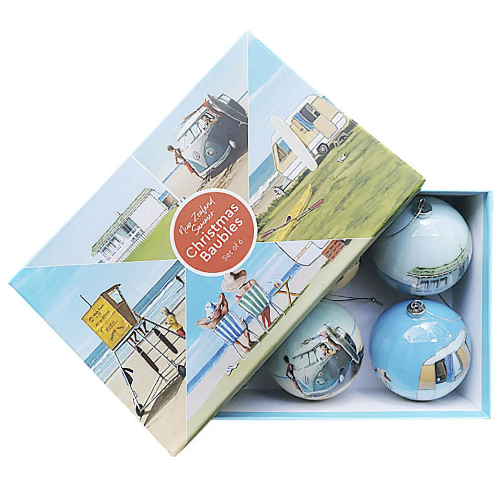 Six acrylic Christmas baubles featuring NZ Kiwi Summer scenes — bach, beach, tractor and more — by Graham Young Artist
