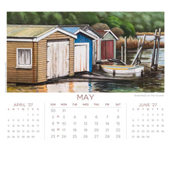 May page of the desk 2027 calendar featuring "Boatsheds on the Sounds" by Graham Young Artist